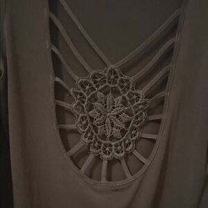 Elegant Black Jersey Material Top with Crochet Detail